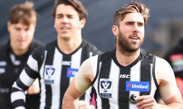 180828_hellier620.png VFL captain Jack Hellier leads his Magpies out onto Victoria Park ahead of their win over Frankston in round 20. Photo: Luke Henry. - Collingwood,Collingwood Magpies
